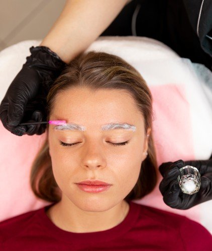 beautiful young woman going through microblading treatment.jpg